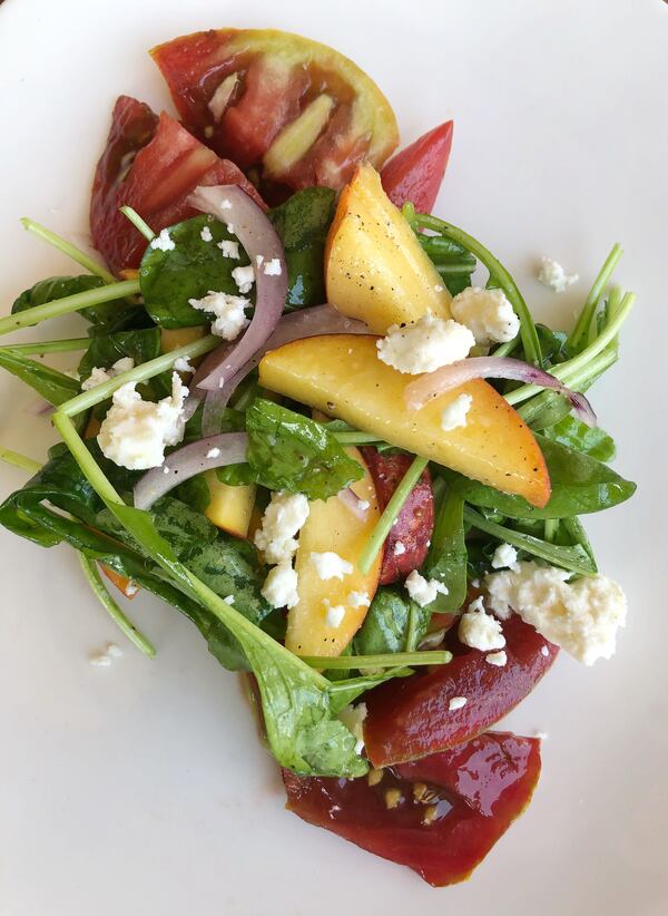 The peach salad on Muss & Turner's dinner menu features Pearson Farm peaches.