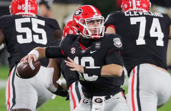 Georgia quarterback JT Daniels (18) competes a pass against the Mississippi State Bulldogs Saturday, Nov. 21, 2020 at Sanford Stadium in Athens. (Curtis Compton / Curtis.Compton@ajc.com)  