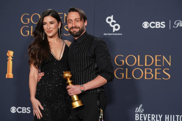 Kieran Culkin, right, winner of the award for best performance by an actor in a supporting role in any motion picture for "A Real Pain" poses with Jazz Charton during the 82nd Golden Globes on Sunday, Jan. 5, 2025, at the Beverly Hilton in Beverly Hills, Calif. (AP Photo/Chris Pizzello)