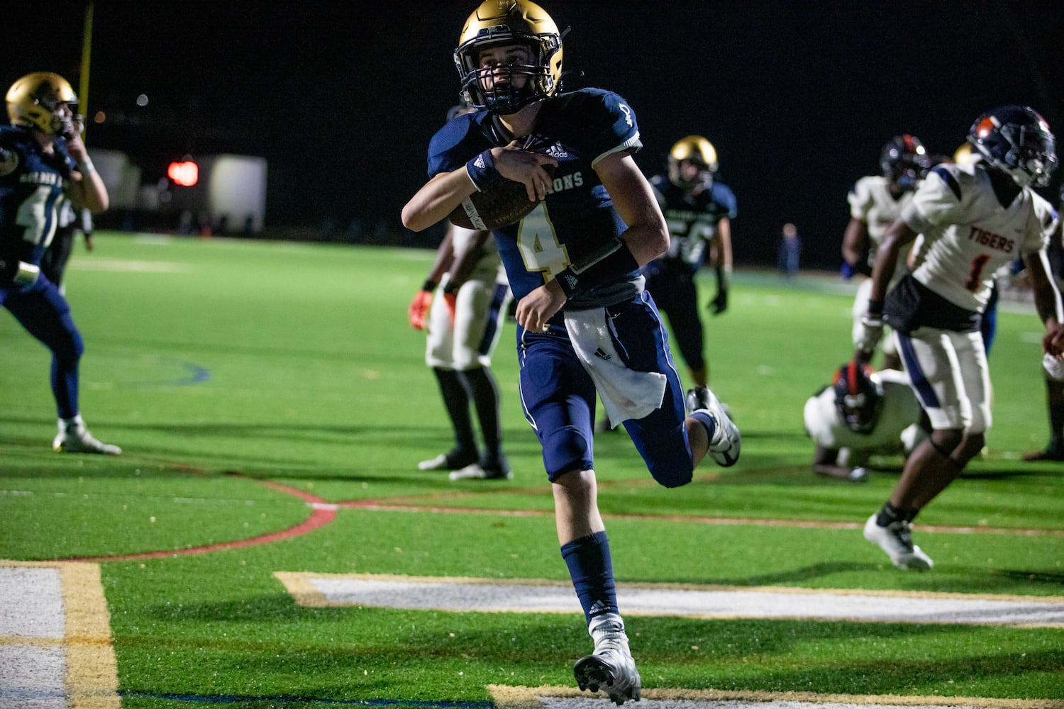 St. Pius’ Jack Mount (4) scores a touchdown during double overtime of a GHSA High School football game between St. Pius and Mundy’s Mill at St. Pius Catholic School in Atlanta, GA, on Friday, November 11, 2022.(Photo/Jenn Finch)