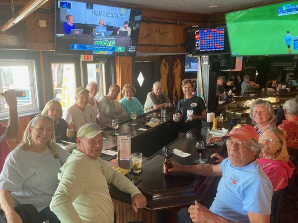 The "Wordle Turtles" lunch group gathers daily at TKO Malley's Sports Cafe in Scituate, Massachusetts, hometown of Savannah Bananas owner Jesse Cole. (Adam Van Brimmer/AJC.com)