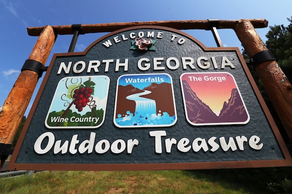 A welcome sign on on US 441 North, in Cornelia, touts North Georgia as an “outdoor treasure.” Environmental groups say the region is at risk from a Trump administration plan to speed up timber cutting, without public input or scientific studies of most projects. CURTIS COMPTON / CCOMPTON@AJC.COM