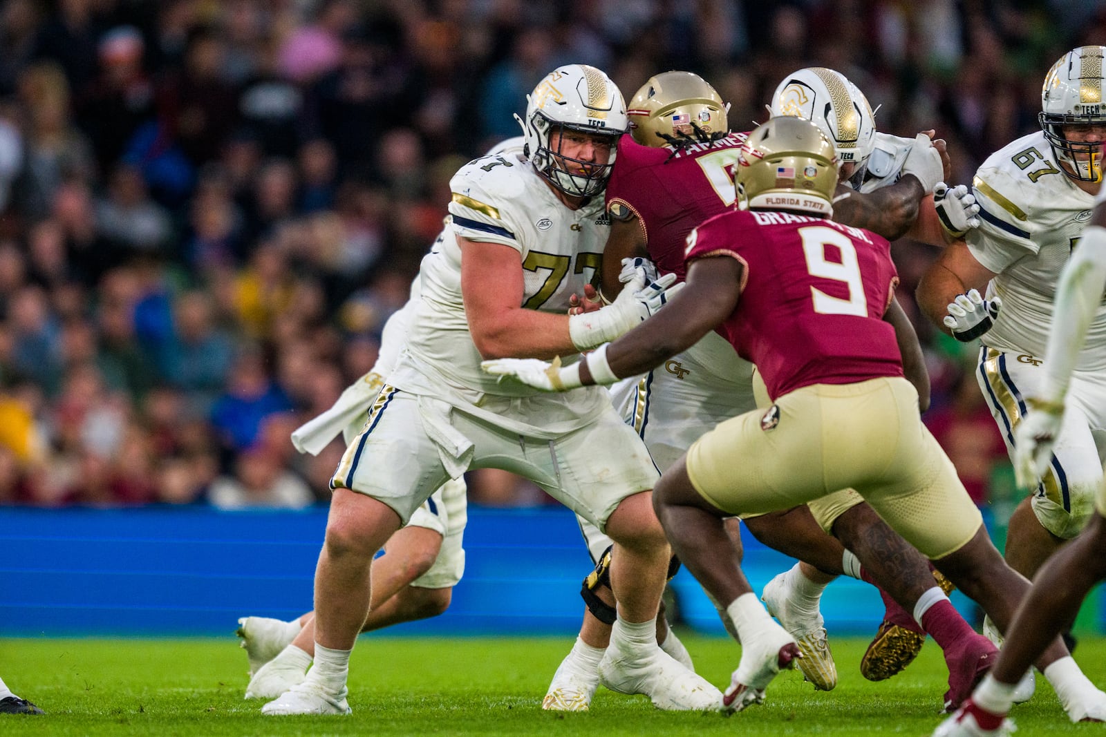 Georgia Tech offensive lineman Keylan Rutledge (77) in action in a game against Florida State on Aug. 24, 2024 at Aviva Stadium in Dublin, Ireland. (Photo by Georgia Tech Athletics/Danny Karnik)