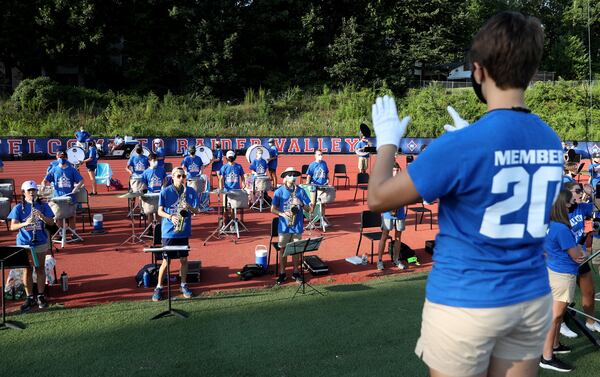 The Walton High School marching band performs in the end zone during a home football game against Kell in Marietta on Sept. 4, 2020. JASON GETZ FOR THE ATLANTA JOURNAL-CONSTITUTION