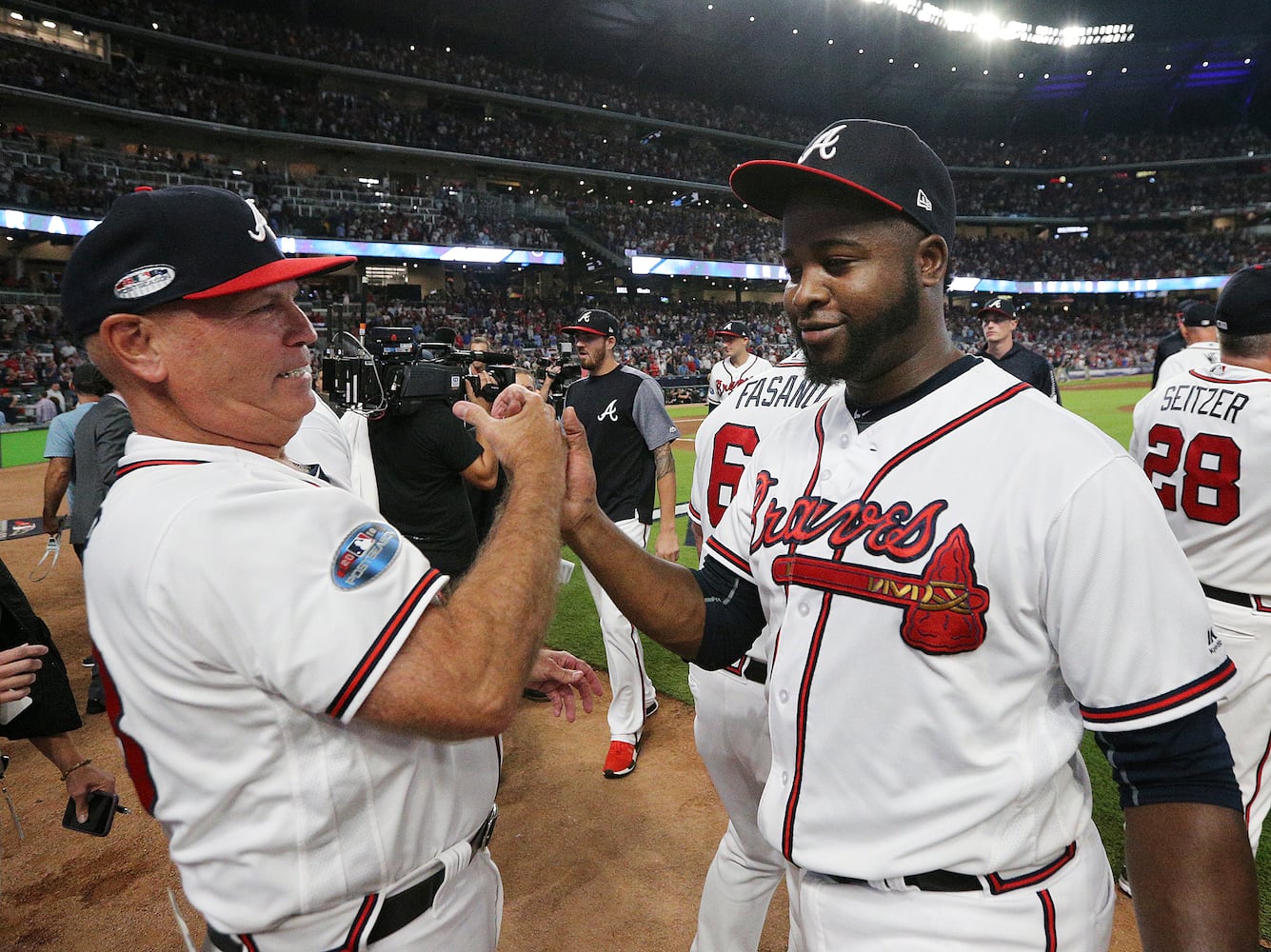 Photos: Acuna, Freeman lead Braves to playoff win over Dodgers