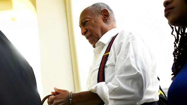 Bill Cosby is taken away in handcuffs after he was sentenced to three-to 10-years for felony sexual assault on Tuesday, Sept. 25, 2018, in Norristown, Pa. (Mark Makela/Pool Photo via AP)