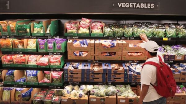 CHICAGO, IL - JUNE 12: Customers shop at an Aldi grocery store on June 12, 2017 in Chicago, Illinois. Aldi has announced plans to open 900 new stores in the United States in the next five years. The $3.4 billion capital investment would create 25,000 jobs and make the grocery chain the third largest in the nation behind Wal-Mart and Kroger. 