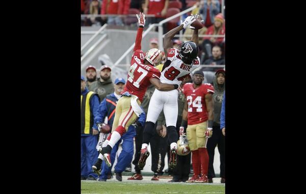 Atlanta Falcons wide receiver Roddy White (84) cannot catch a pass while defended by San Francisco 49ers defensive back Marcus Cromartie (47) during the second half of an NFL football game in Santa Clara, Calif., Sunday, Nov. 8, 2015. (AP Photo/Marcio Jose Sanchez)