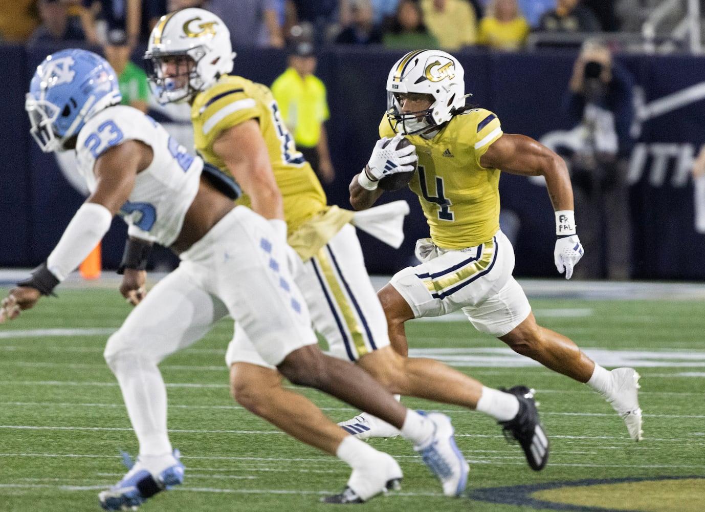 Georgia Tech Yellow Jackets running back Dontae Smith (4) runs for a first down during the first half.  (Bob Andres for the Atlanta Journal Constitution)