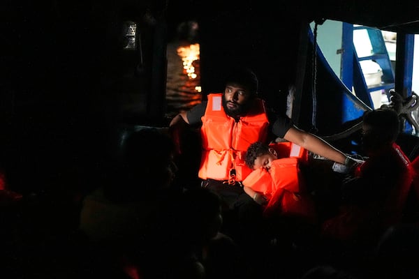 Venezuelan migrant Veiker Queral boards a boat departing from Panama's Caribbean coastal village of Miramar to the border with Colombia, Thursday, Feb. 27, 2025. The migrants are returning from southern Mexico after giving up on reaching the U.S., a reverse flow triggered by President Trump administration's immigration crackdown. (AP Photo/Matias Delacroix)