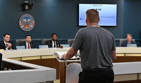 Thomas Hyneman testifies in favor of an ordinance reducing the speed limit to 25 mph on most city of Atlanta streets during an Atlanta City Council Transportation Committee meeting at Atlanta City Hall on March 11, 2020. Hyneman sank into a depression after his daughter was killed crossing an Atlanta street in 2016. Therapy and a newfound passion for advocacy helped him to live again. (Hyosub Shin / Hyosub.Shin@ajc.com)