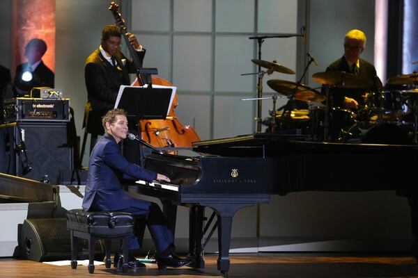 Singer/pianist Michael Feinstein performs on stage during the 2017 Gershwin Prize Tribute Concert honoring Tony Bennett at the DAR Constitution Hall on Wednesday, Nov. 15, 2017 in Washington. (Photo by Brent N. Clarke/Invision/AP)