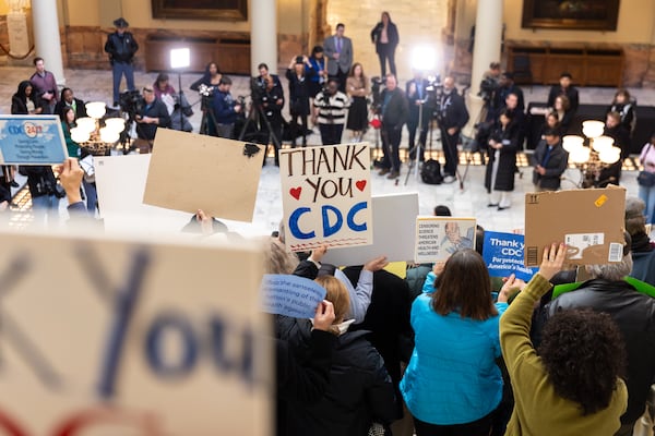 Supporters and public health workers, including fired Centers for Disease Control and Prevention workers, gather at the Capitol in Atlanta on Friday, Feb. 21, 2025, to protest the CDC cuts of hundreds of employees. (Arvin Temkar/AJC)