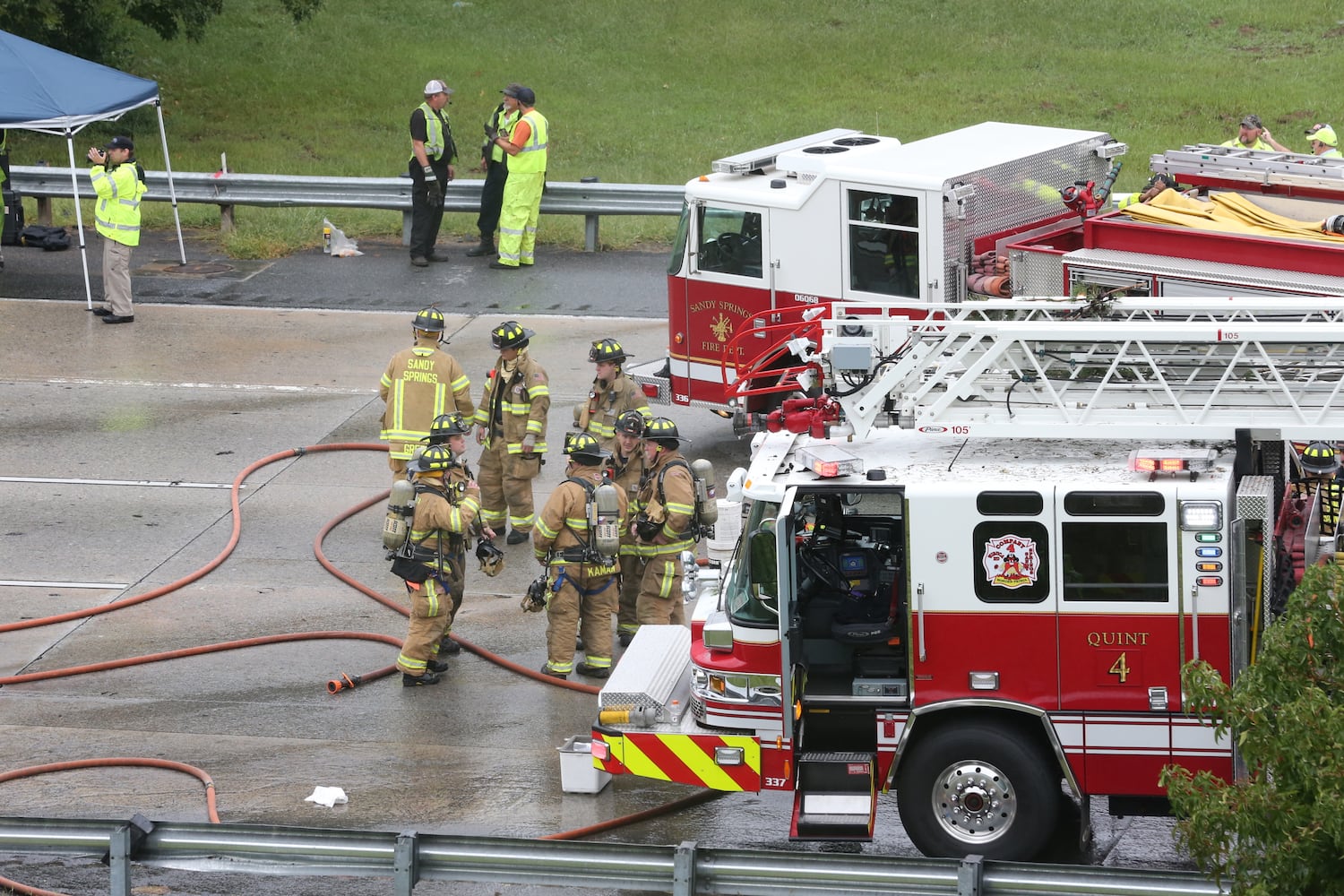 I-285 crash: Trucks plunge off interstate onto Ga. 400