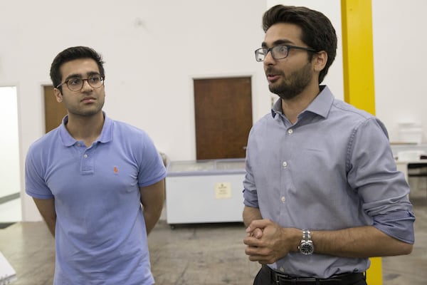 Brothers Rehan (left) and Reza Bhiwandiwalla were inspired by the flavors of their youth in Mumbai to start their company, Icecream Walla. ALYSSA POINTER/ALYSSA.POINTER@AJC.COM