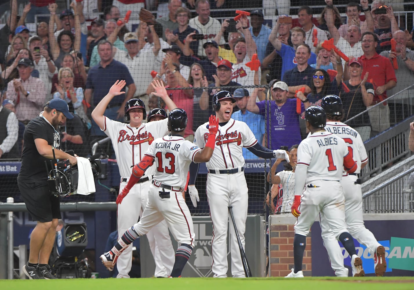 Photos: Acuna hits grand slam as Braves battle Dodgers in Game 3