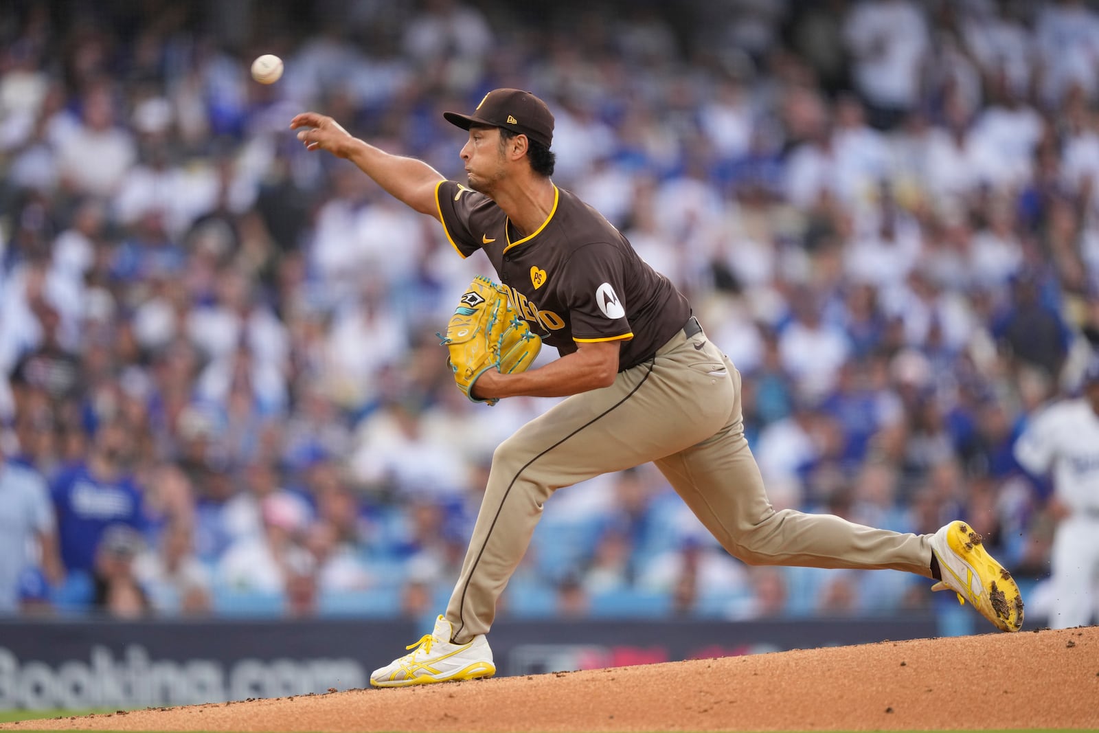 San Diego Padres starting pitcher Yu Darvish throws to a Los Angeles Dodgers batter during the first inning in Game 5 of a baseball NL Division Series Friday, Oct. 11, 2024, in Los Angeles. (AP Photo/Mark J. Terrill)