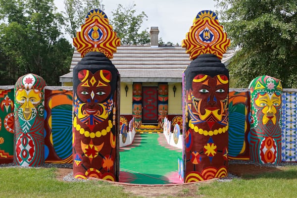 The vibrantly restored entrance to Pasaquan, with painted totems that appear throughout the site. Pasaquan is an art installation created by the late visionary artist Eddie Owens Martin in Buena Vista. (Bob Andres / bandres@ajc.com)