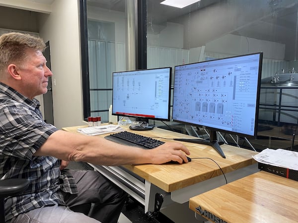 Co-owner and brewmaster Glen Sprouse is in the control room at Ironshield Brewing in Lawrenceville. (Bob Townsend for The Atlanta Journal-Constitution)