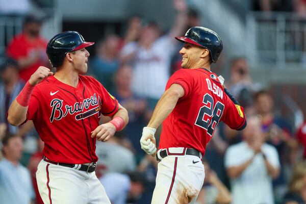 Atlanta Braves’ Matt Olson celebrates his two-run home run with Austin Riley, left, during the fifth inning against the Miami Marlins at Truist Park, Friday, June 30, 2023, in Atlanta. The Braves won 16-4. Jason Getz / Jason.Getz@ajc.com)