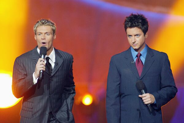 Ryan Seacrest and Brian Dunkleman at FOX-TV's "American Idol" finals at the Kodak Theatre in Hollywood, Ca. Tuesday, Sept. 3, 2002. Photo by Kevin Winter/Getty Images.