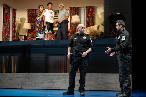 Caroline Stefanie Clay (from left), Cecil Blutcher and Raymond Anthony Thomas stare down at the police (Mark Bedard and Jorge Luna). Blutcher, as the couple's grandson Trent, witnesses a confrontation that leaves him with existential questions about being Black in today's society. Courtesy of Greg Mooney