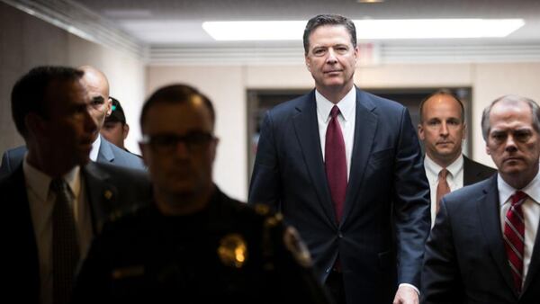 Former FBI Director James Comey leaves a closed session with the Senate Intelligence Committee in the Hart Senate Office Building on Capitol Hill June 8, 2017 in Washington, DC. Comey said that President Donald Trump pressured him to drop the FBI's investigation into former National Security Advisor Michael Flynn and demanded Comey's loyalty during the one-on-one meetings he had with president. (Photo by Drew Angerer/Getty Images)