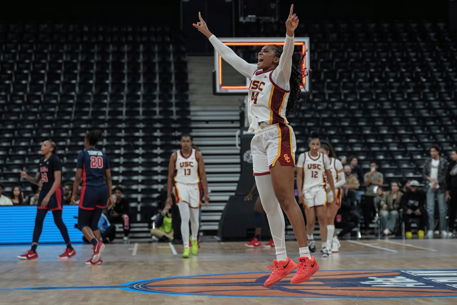 USC Trojans's forward Kiki Iriafen celebrates the victory during the basketball match between the University of Southern California (USC) and Ole Miss, Monday, Nov. 4, 2024 in Paris, France. (AP Photo/Aurelien Morissard)