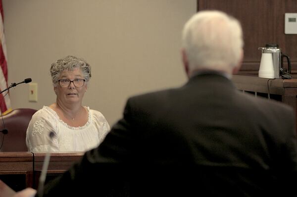 Rhonda Tyson, an ex-wife of Erik Sparre, is questioned by prosecutor Andrew Ekonomou in Brunswick. Ryon Horne/RHORNE@AJC.COM