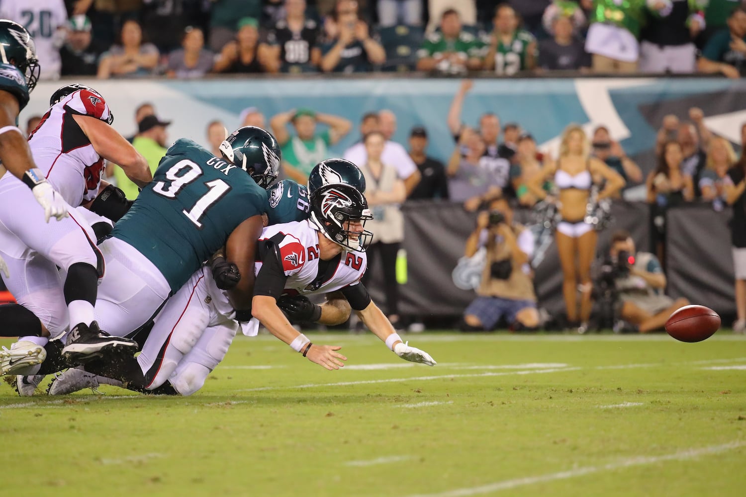 Photos: Falcons fall to Eagles in season opener