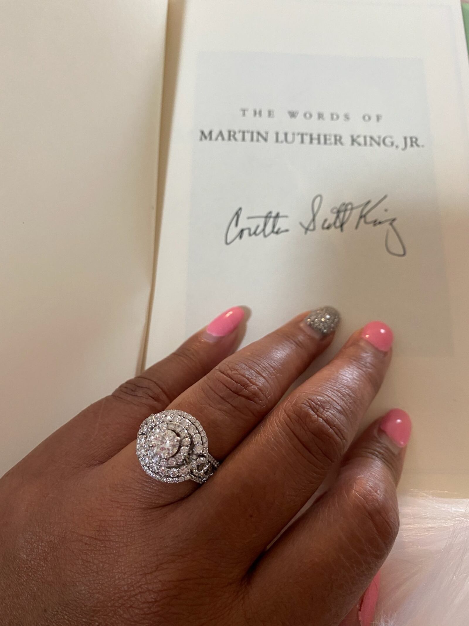 Coretta Whipple with the book that Coretta Scott King signed for her. (Courtesy of Coretta Whipple)