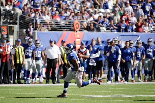 New York Giants running back Shane Vereen runs with the ball against the Atlanta Falcons during the second half of an NFL football game, Sunday, Sept. 20, 2015, in East Rutherford, N.J. (AP Photo/Seth Wenig)