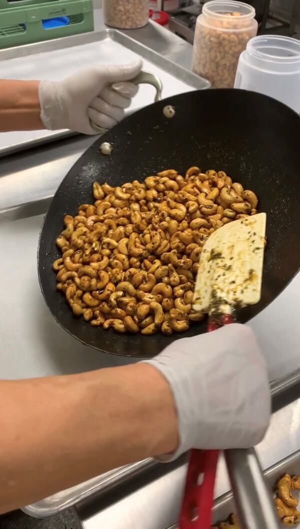 Each batch of cashews from Elise’s Artisan Nuts is made by hand in their commercial kitchen on DeFoor Avenue.  
(Courtesy of Elise’s Artisan Nuts)