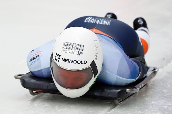 Kimberley Bos, of the Netherlands, slides during her first run at the skeleton world championships, Thursday, March 6, 2025, in Lake Placid, N.Y. (AP Photo/Julia Demaree Nikhinson)