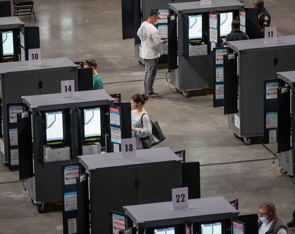 Fulton County uses ballot cabinets that prop touchscreens higher than they would be on a table, making them more visible. A former member of the county's election board said in a July 2020 email cited in court documents that the cabinets mean that "casting a private ballot is impossible for our voters." (Alyssa Pointer / Alyssa.Pointer@ajc.com)