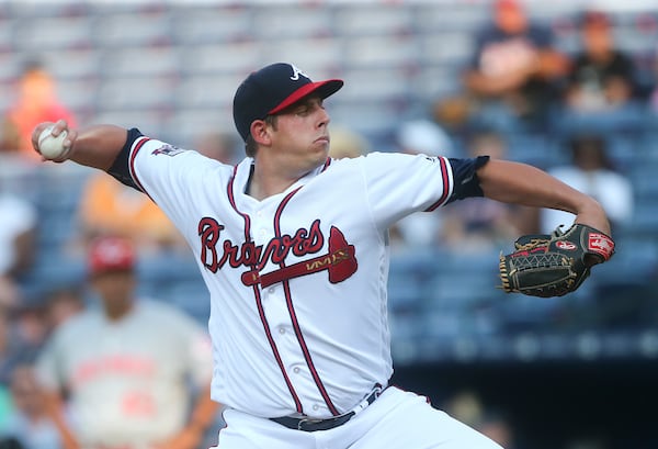 Atlanta Braves starting pitcher Aaron Blair works during the first inning of a baseball game against Cincinnati Reds on Monday, June 13, 2016, in Atlanta. (AP Photo/John Bazemore)