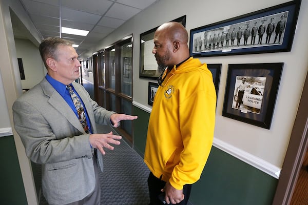 LaGrange Police Chief Louis M. Dekmar, left, and Troup County NAACP president Ernest Ward meet on Wednesday, Jan. 25, 2017, at the police department in LaGrange. The chief’s public apology for his agency’s role in the 1940 lynching of a black man is believed to be among the first ever for a law enforcement agency. CURTIS COMPTON/CCOMPTON@AJC.COM