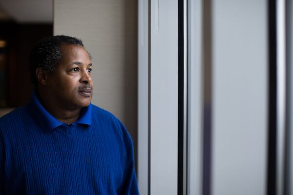 Timothy Johnson poses for a photo at his Lawyer's office, Monday, Nov. 9, 2015, in Atlanta. Johnson, who spent 29 years in prison, has filed a federal lawsuit against Houston County law enforcement after he was wrongly prosecuted for a 1984 murder and state prison officials for violating his civil rights. Johnson was acquitted of all charges two years ago by a Houston County Jury.