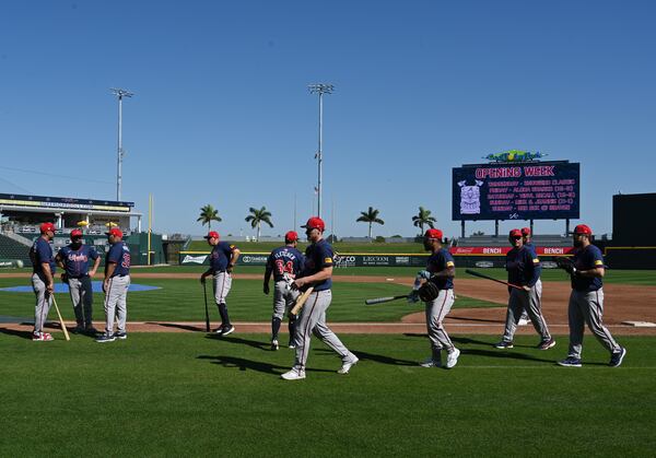 Braves players and staff members getting ready for a spring training workout in 2024.