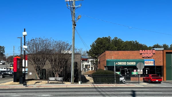 A check cashing store had its glass front door broken out. 