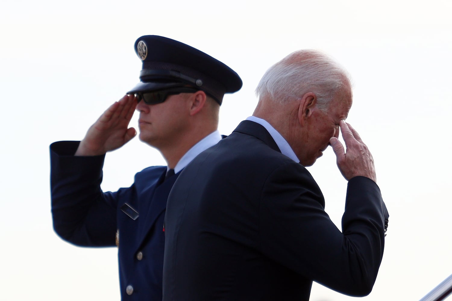 President Joe Biden salutes as he boards Air Force One at Joint Base Andrews in Maryland on Thursday, July 1, 2021, as he and first lady Jill Biden travel to Surfside, Fla., where they are scheduled to meet with first responders and family members of victims of the partially collapsed Champlain Towers South condo building. (Tom Brenner/The New York Times)