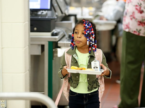 Providing basic essentials, such as hot meals for students, is also part of Harper-Archer’s mission. Bob Andres / robert.andres@ajc.com  