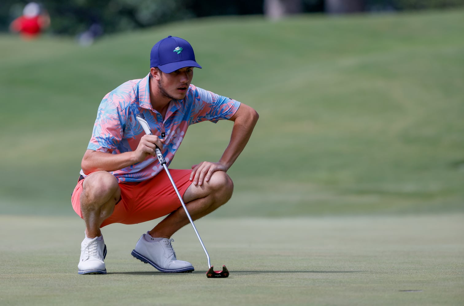 Alex Heffner, Davidson College, who finished fifth and 13 under par, lines up a putt during the final round of the Dogwood Invitational Golf Tournament in Atlanta on Saturday, June 11, 2022.   (Bob Andres for the Atlanta Journal Constitution)