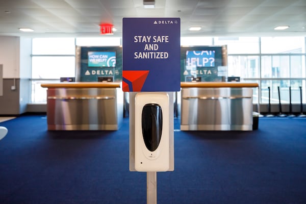 A Delta Air Lines hand sanitizer station at John F. Kennedy International Airport in New York. (Stefano Ukmar/The New York Times) 