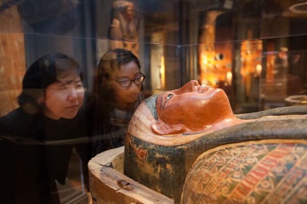 Visitors to Emory University's Michael C. Carlos Museum get up close to a mummy on exhibit. CONTRIBUTED BY ATLANTA CONVENTION AND VISITORS BUREAU