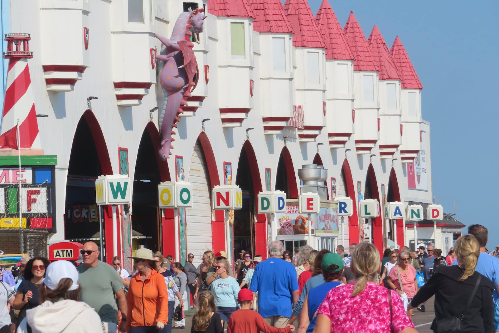 Rotating letter signs spell out "Wonderland" along the facade of Gillian's Wonderland, the popular amusement park on the boardwalk in Ocean City, N.J., during its final day of operation before shutting down for good, Sunday, Oct. 13, 2024. (AP Photo/Wayne Parry)