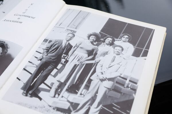 Views of a 1979 yearbook photo of Morris Brown College alumna Carmen Richardson (second from left) with fellow student government association members shown on Tuesday, September 5, 2023. (Natrice Miller/ Natrice.miller@ajc.com)