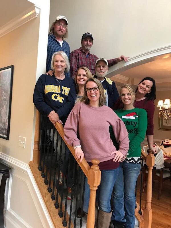 LaNelle and Perry Holland with their six children.  