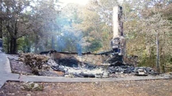 The home on Old Mill Road was completely destroyed, according to the Georgia safety fire commissioner.