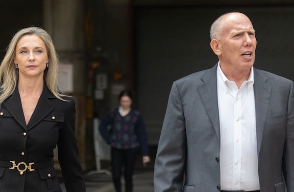 Trump's lawyers Jennifer Little, left, and Steve Sadow, right, have sought to have charges against the former president dismissed. (Michael Blackshire/The Atlanta Journal-Constitution/TNS)